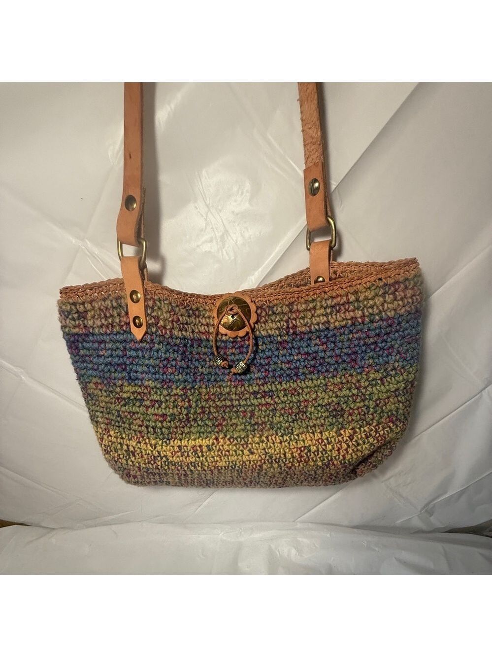 Todot crochet bag with leather straps.